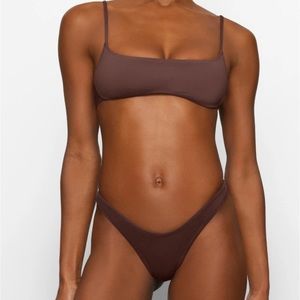 Brown skims bikini